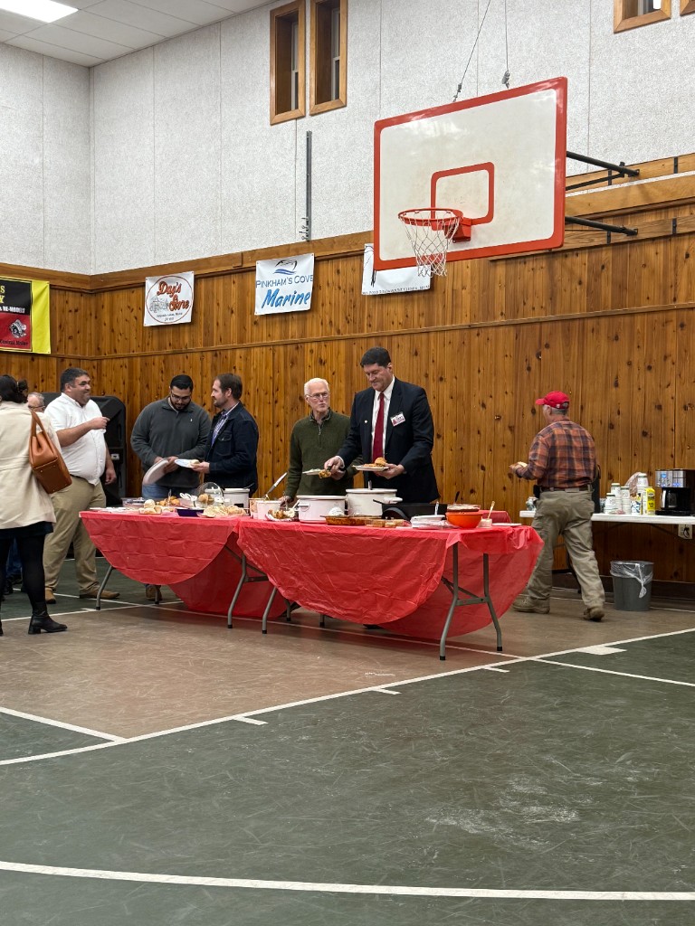Lead canvasser coordinating with team in the field